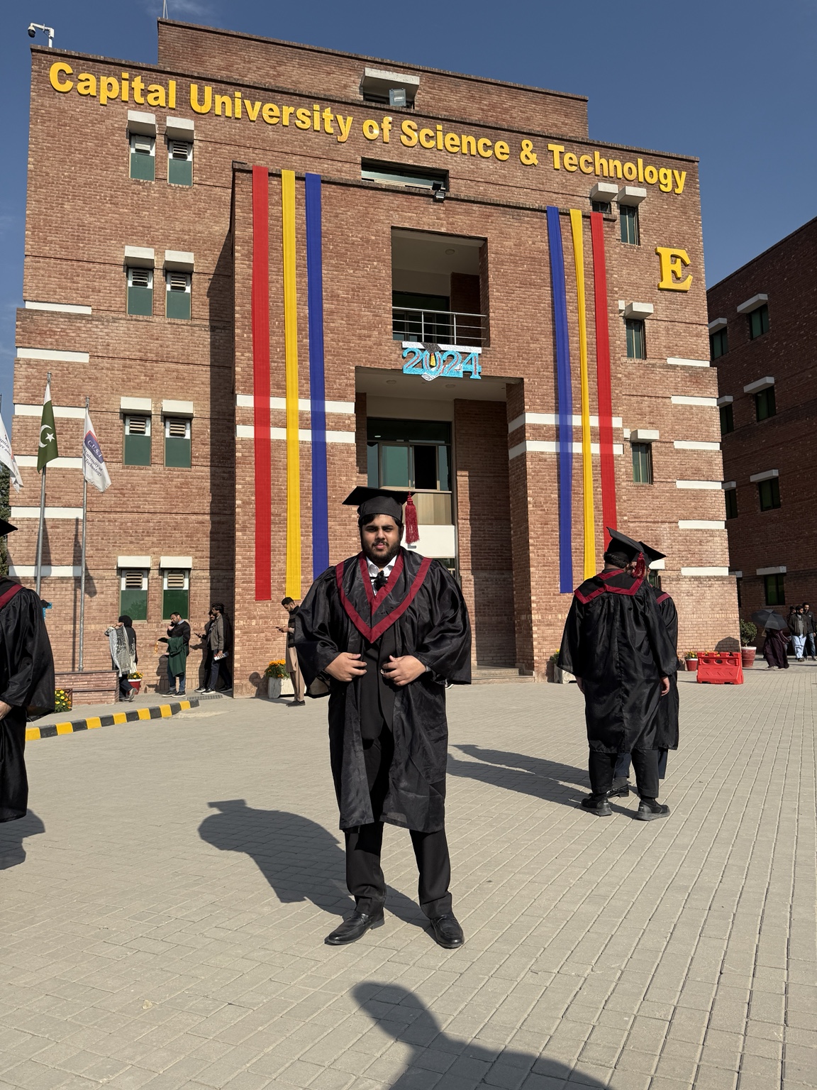 Ibne Shukran outside the CUST building decorated for graduation